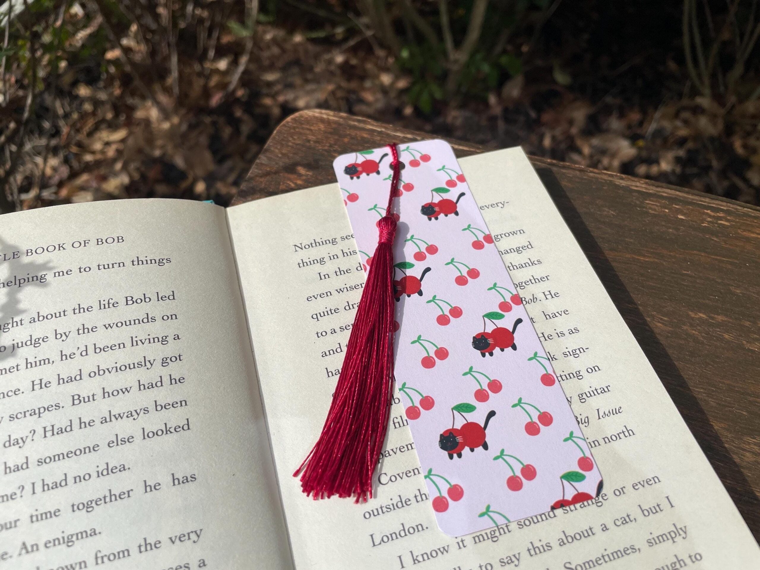 cat cherry bookmark – whimsical tassel design cat cherry bookmark – whimsical tassel design