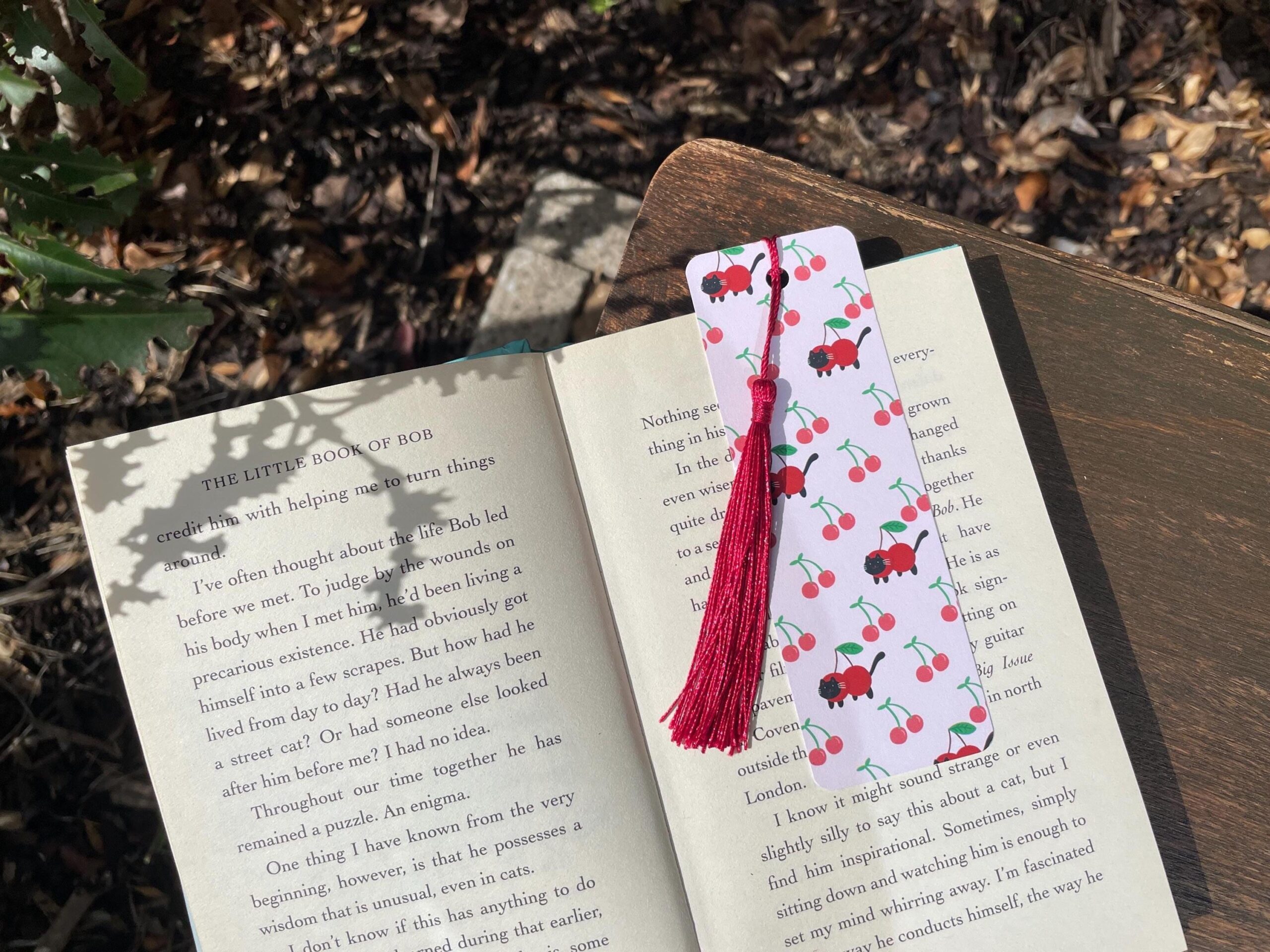 cat cherry bookmark – whimsical tassel design cat cherry bookmark – whimsical tassel design